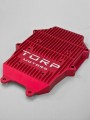 Sterownik Torp TC1000 czerwony – radiator i kompaktowa obudowa kontrolera do motocykla elektrycznego.