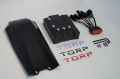 Sterownik TC1000 Torp dla Surron Light Bee – kompletny zestaw z kontrolerem, wiązką i osłoną na stole.